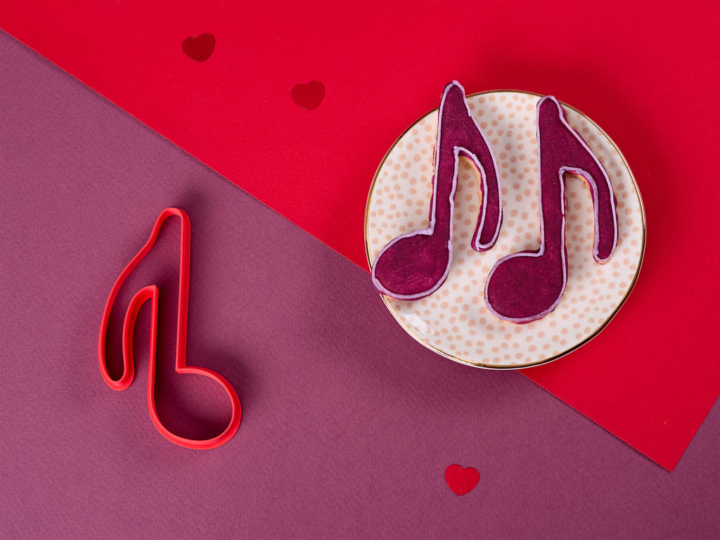 Keksausstecher Note mit dekorierten Keksen