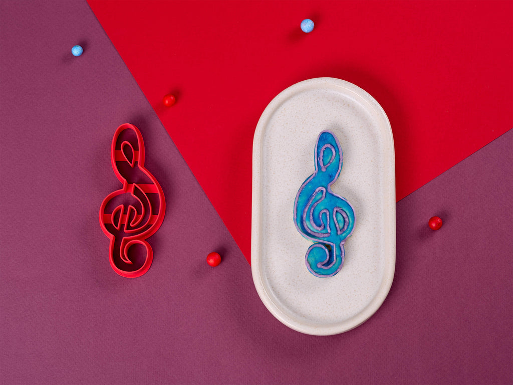 Keksausstecher Notenschlüssel mit dekorierten Keksen